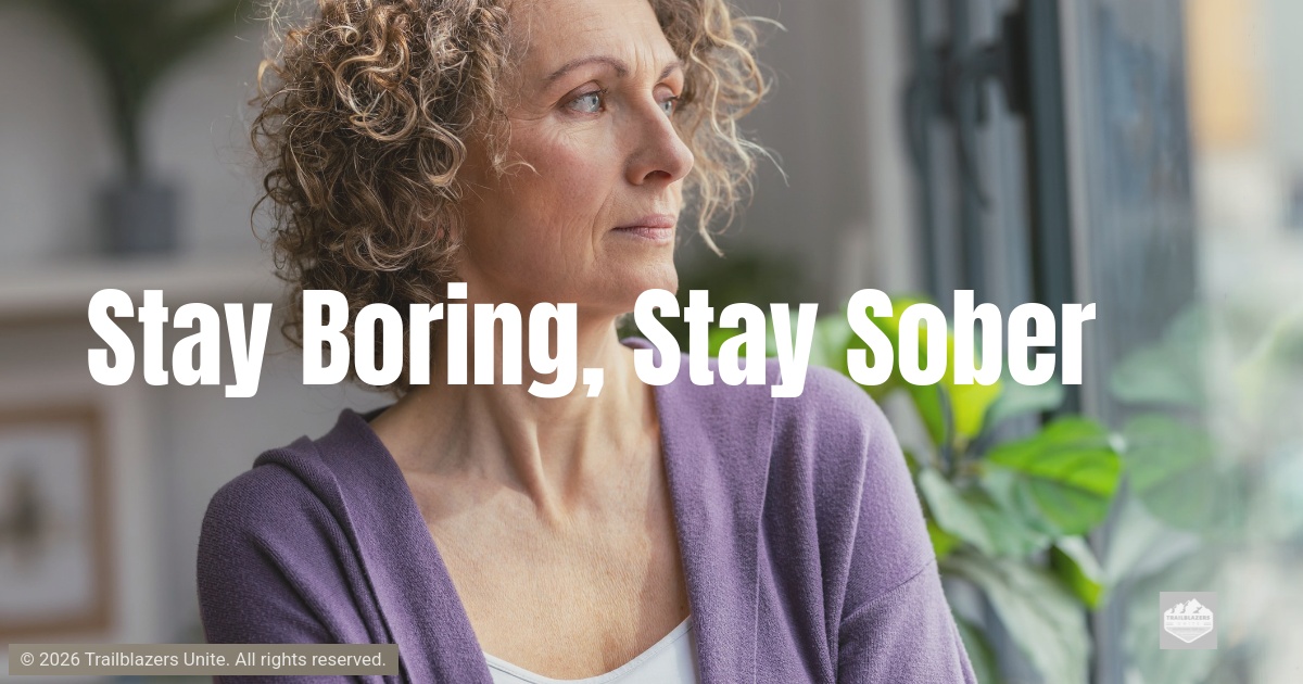 Person standing indoors near a window, looking outward with a calm expression, representing steadiness, routine, and intentional living.